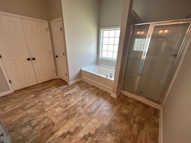 Building Photo - 4 Bedroom | 3 Bathroom Apex Home with Fenc...