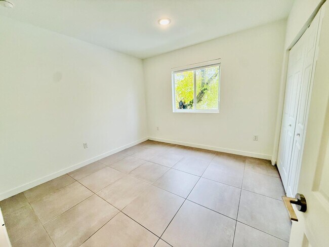 Building Photo - 1295 W 69th St