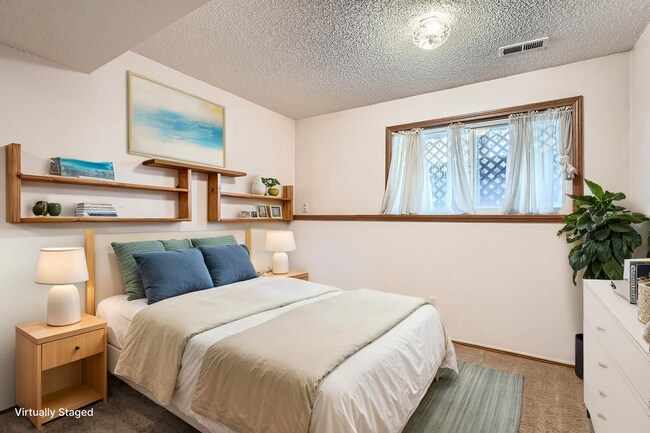 Building Photo - Spacious 2-Bed Townhome with Private Yard & 2-Car Garage in Aurora