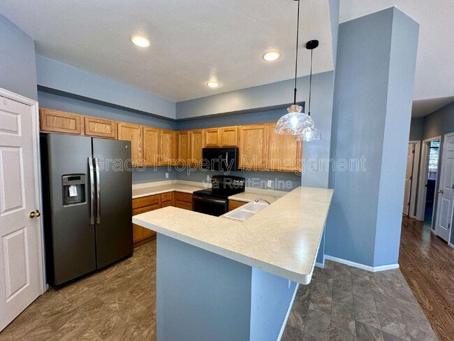 Building Photo - 9064 W Phillips Dr