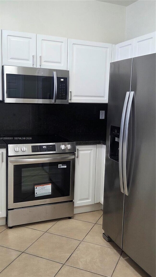 Building Photo - 5440 NW 107th Ave