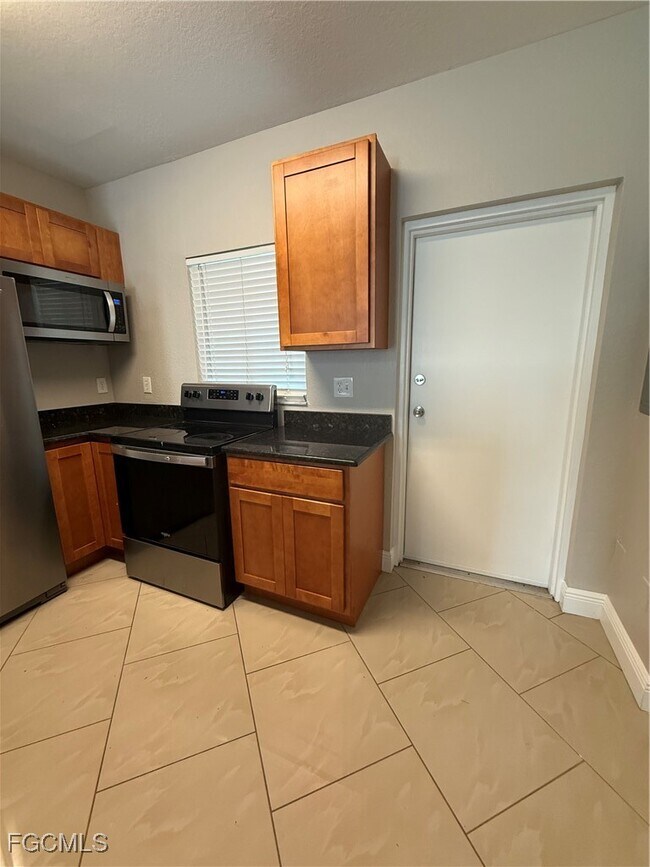 Building Photo - 8555 Bernwood Cove Loop