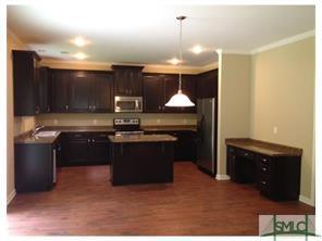 Building Photo - 5 bed 3 bath Home with a Fenced Yard and Hot Tub