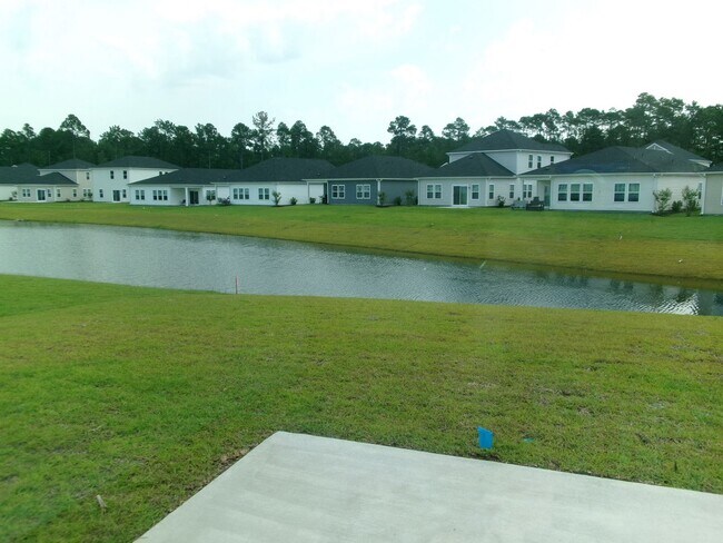 Building Photo - New 5 bedroom, 3 bath home in Clear Pond with pond view