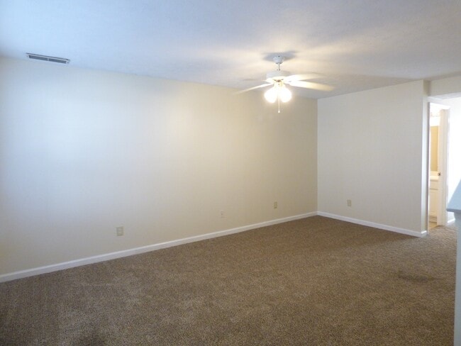 Building Photo - COMING SOON! Spacious Townhouse, W/D Hookups, Off-Street Parking, All Electric!