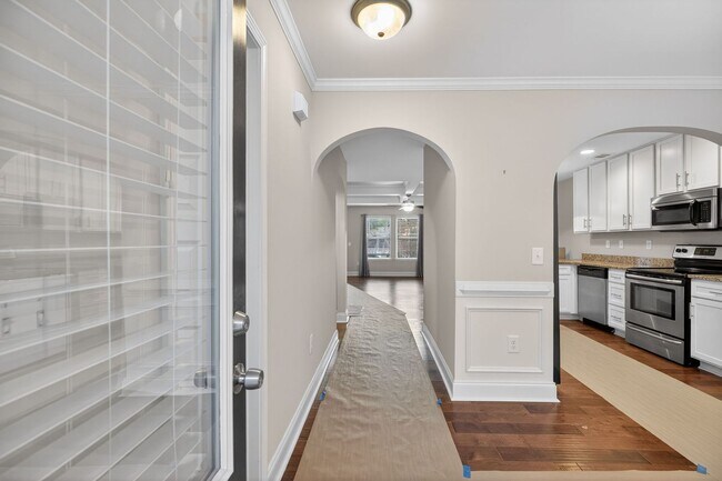 Building Photo - Move-In Ready Gem with Main-Level Owner's Suite