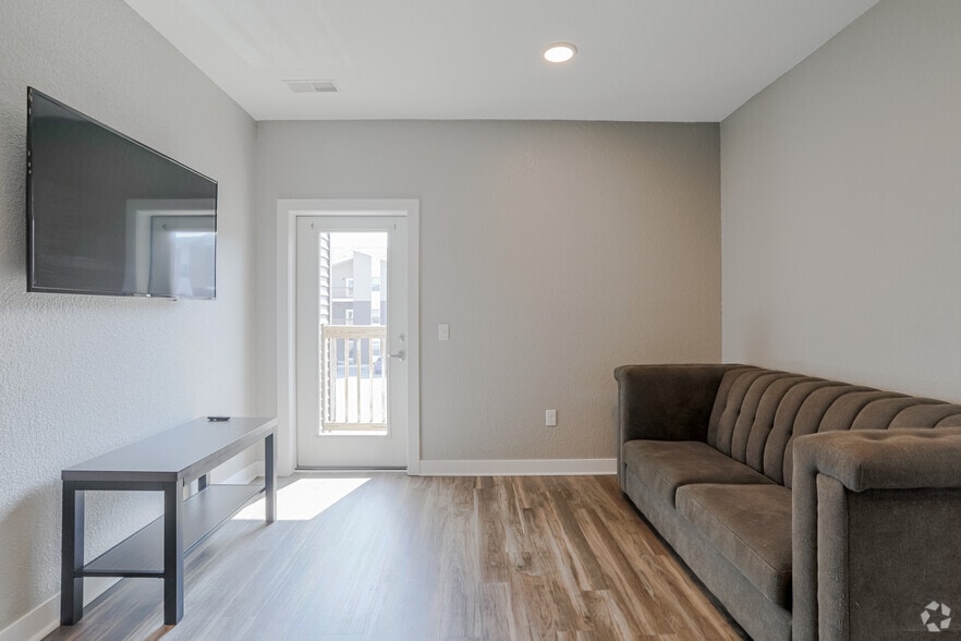 4 BR, 2 BA - Living Room - Eight Thirty Water Tower