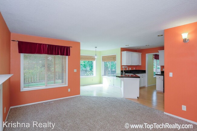 Building Photo - 4 br, 2.5 bath House - 5910 NW Snowlily Dr