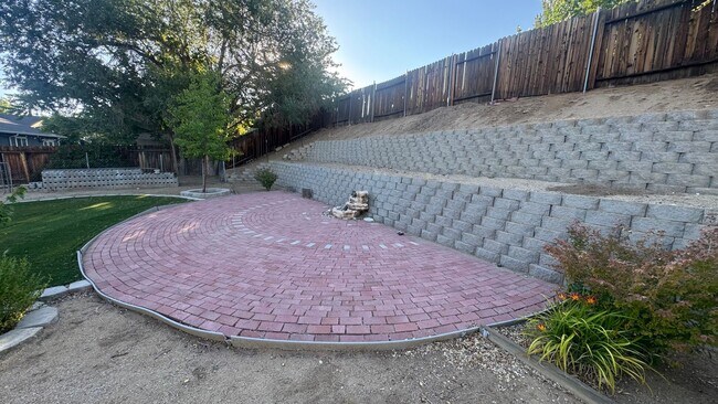 Building Photo - 4bed/2bath/2car garage. RV parking & massive landscaped backyard in cut-de-sac
