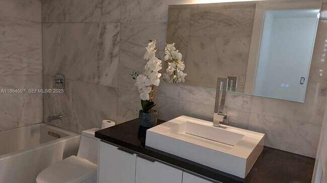 Building Photo - 3180 S Ocean Dr