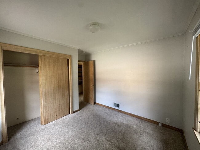 Building Photo - 3BR/1BA in Roseville Featuring A Sprawling Fenced Yard & An Attached Garage
