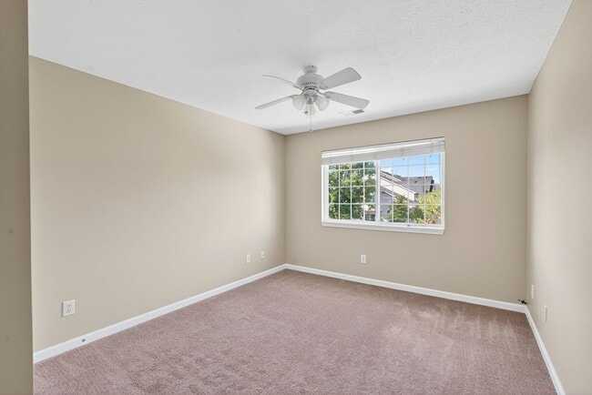 Building Photo - Charming Fishers Condo – Move-In Ready