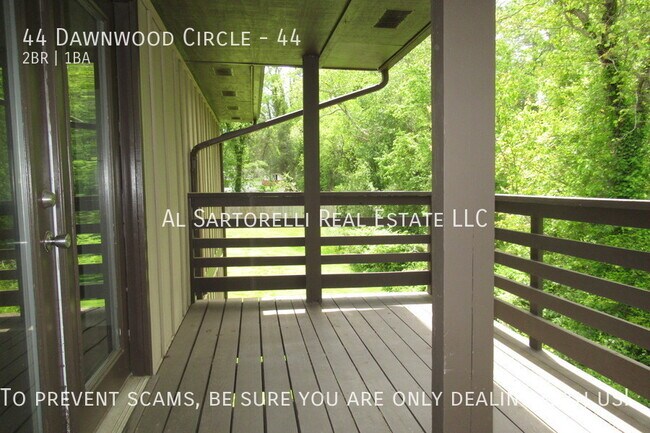 Building Photo - Pet Friendly Condo close to town and ready...
