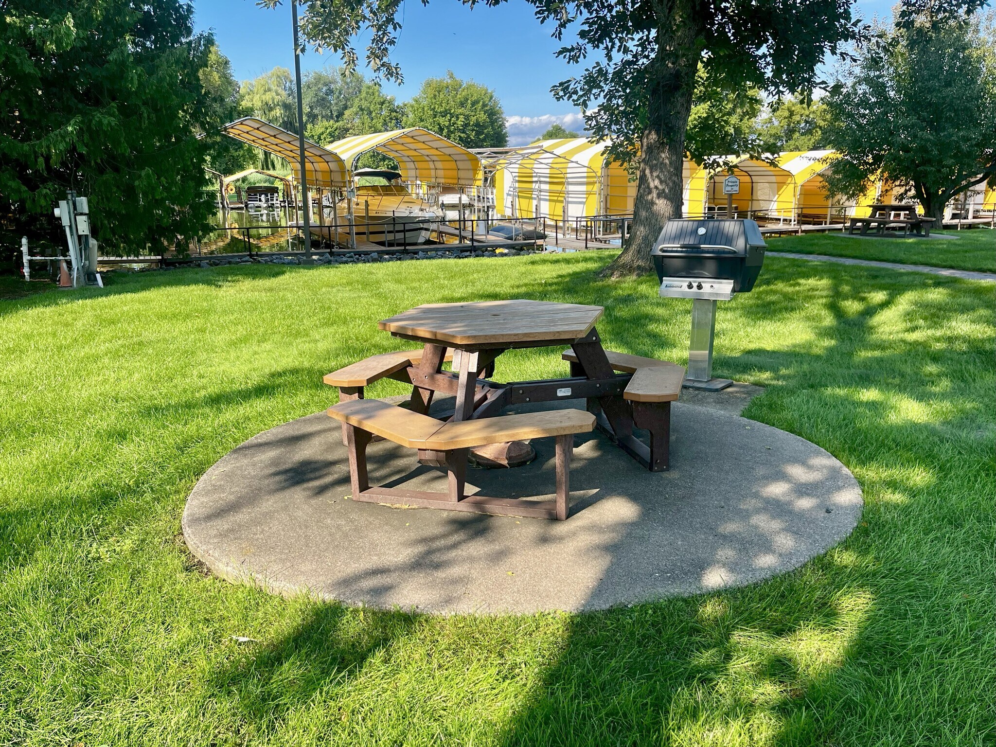 Picnic table and grass grills - 5420 Three Points Blvd