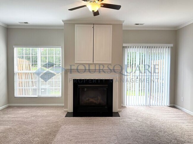 Building Photo - Lovely 3-Bedroom Townhome with Fireplace, Back Patio  & Community Amenities Included! Convenient ...