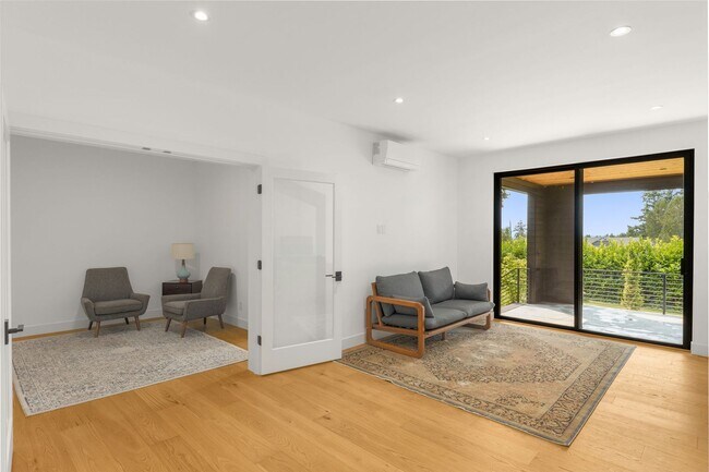 Building Photo - Stunning remodeled apartment with large walk-out patio