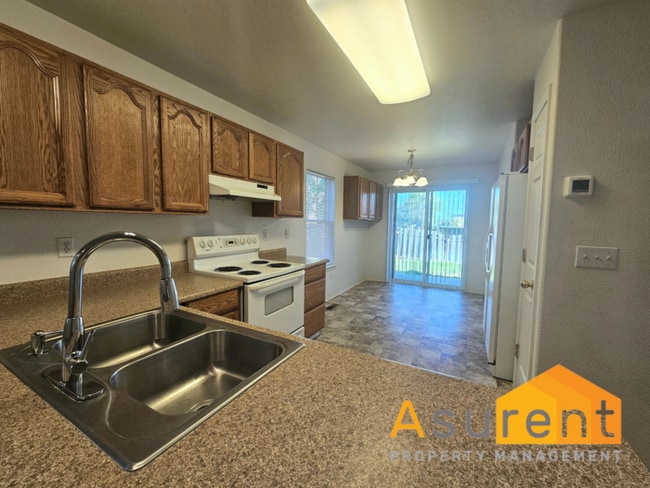 Building Photo - Great Open Concept Townhome Available Soon!