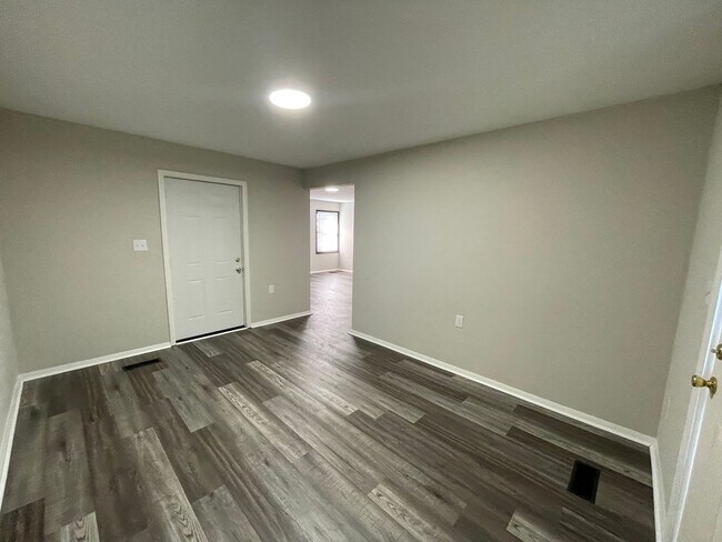 Building Photo - Oversized 3 Bedroom with laundry room!