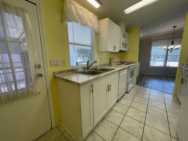 Building Photo - 2 BR 2 BATH Annual Rental in Barefoot Bay Available JUNE 2025