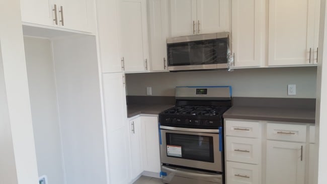 Brand New Stove and Microwave Hood - 20021 Vanowen St