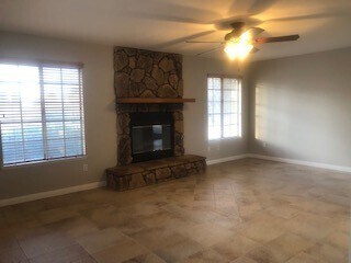 Building Photo - DESERT KNOLLS 3 BEDROOM HOME WITH LARGE RV GARAGE!