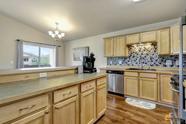 Building Photo - East Anchorage Home with Utilities Included!! Close to JBER! Attached Two Car Garage + Fenced in ...