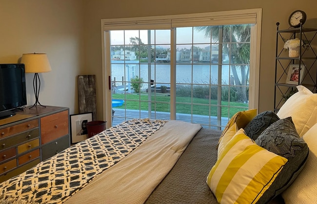 Building Photo - OPEN HOUSE 11AM-1PM Sunday 7/19 - Rare prime waterfront home right on the San Mateo Lagoon, avail...