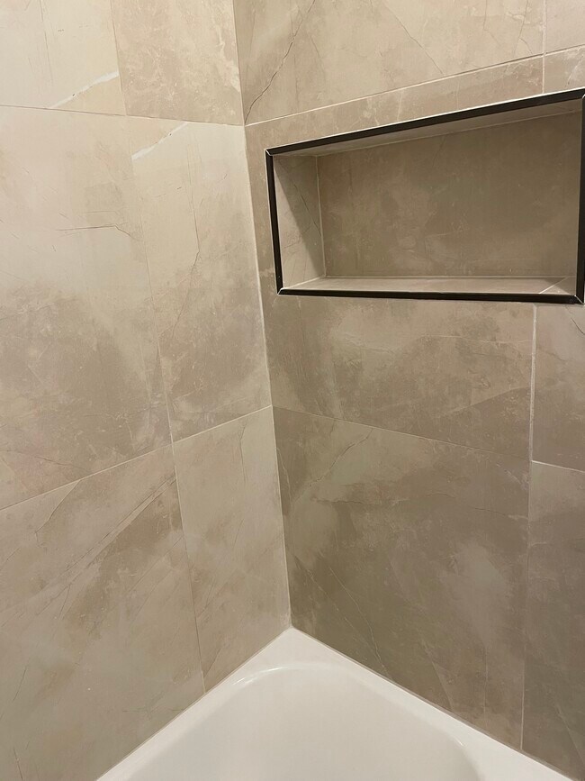 Shower niche for shampoos, etc. - 5350 Kincaid St
