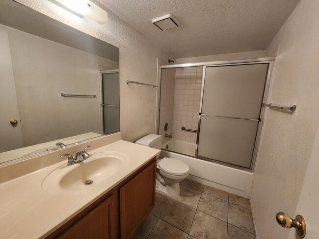 Building Photo - Affordable Condo, Perfect Living Space, Ex...
