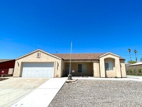 Building Photo - Inviting 3 Bedroom Home with RV Parking an...