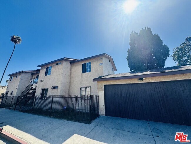 Building Photo - 7704 S Grand Ave