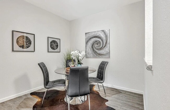 Building Photo - Beautiful & spacious 1 bedroom  updated condo with private patio and covered parking.