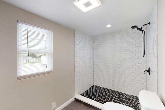 Building Photo - Half-Off 1st Month’s Rent! | Renovated 2BR Home + Bonus Room