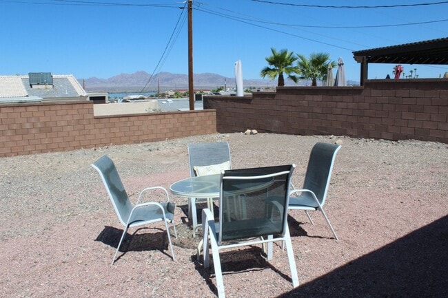 Building Photo - Long Term Rental! Available Unfurnished OR...