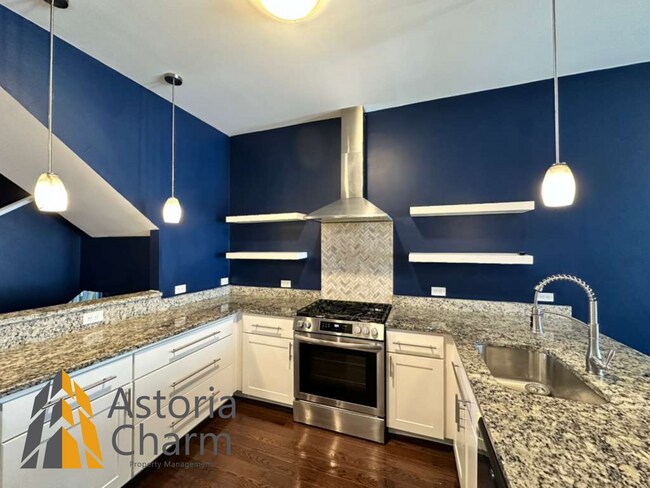 Building Photo - Beautifully Renovated 3BR Rowhome Near Johns Hopkins – Gated Parking + Modern Upgrades