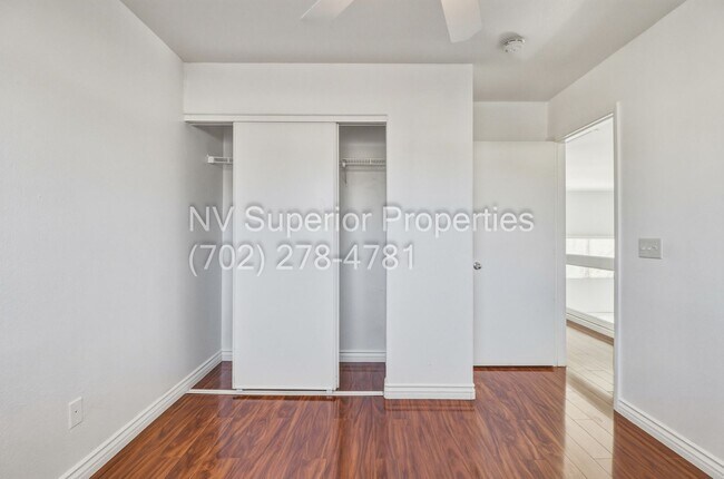 Building Photo - SE!!! 4 Bedrooms!! Master Downstairs!! No Carpet!! Synthetic Grass front and back!!