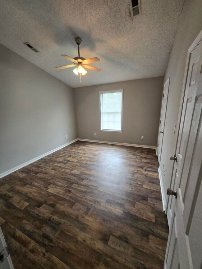 Building Photo - Spacious 2-Bedroom Townhome – Private Deck...