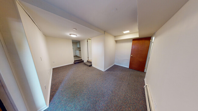OB - Living Room - The Badger Den Apartments on Gilman