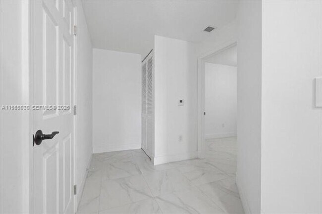 Building Photo - 8390 SW 72nd Ave