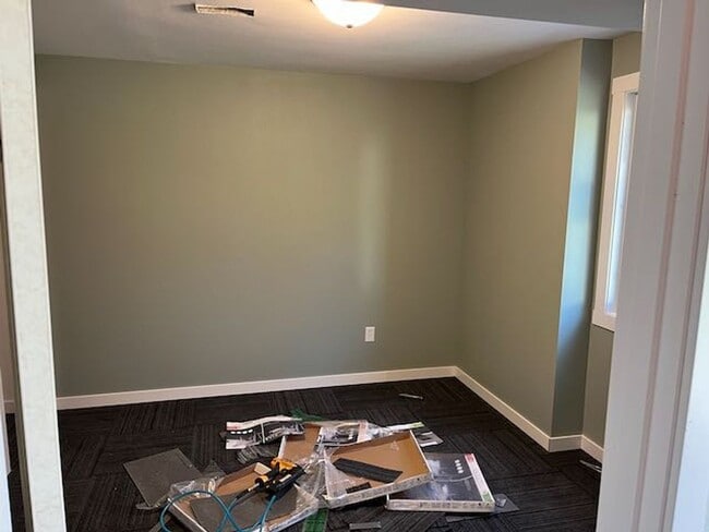 Building Photo - Clean three bedroom one bath duplex with walk out basement looking at trees, across from park