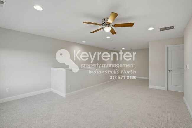 Building Photo - Located in Westfield, IN, this attractive 3-bedroom, 2.5-bath home sits on a corner lot within an...