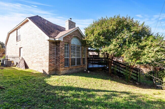 Building Photo - "Beautiful 4-Bedroom Home with Expansive Deck and Spacious Living Areas!"