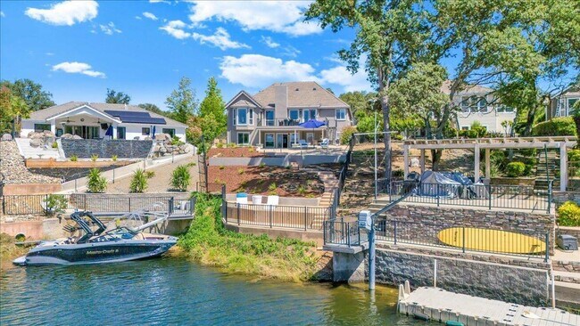 Building Photo - Luxury Lakefront Retreat with Pool, Hot Tub & Private Dock on Lake Tulloch - Recently Remodeled!