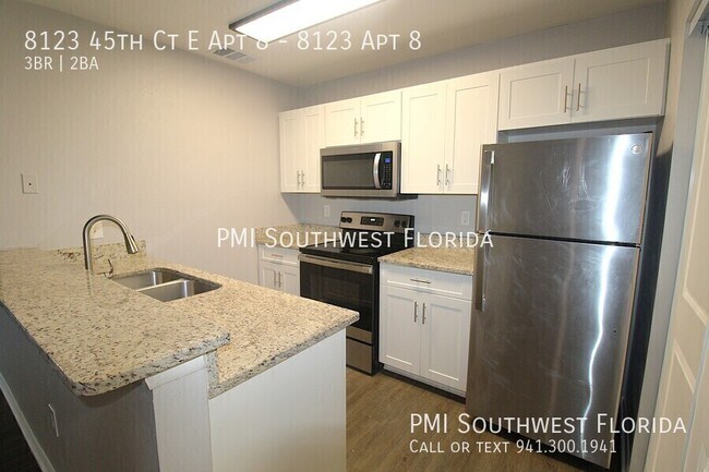 Building Photo - 8123 45th Ct E