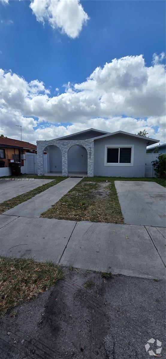 Building Photo - 1284 W 38th Pl