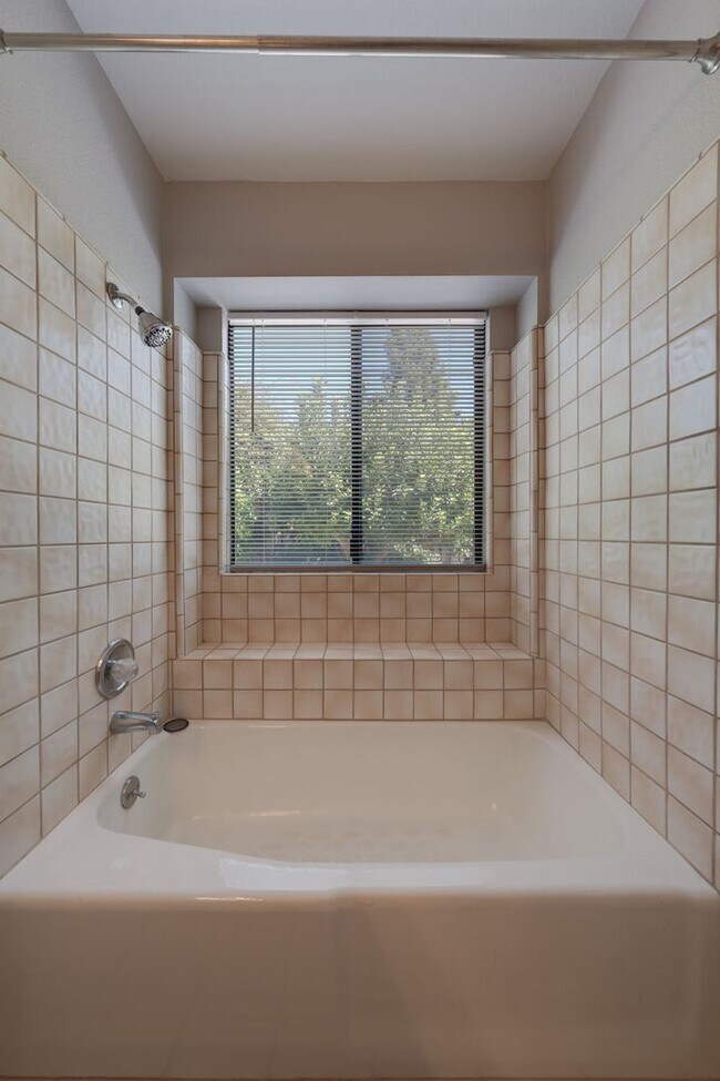 Building Photo - Bright and Stylish 4BD/2BA Home with 3 Car...