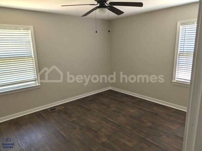 Building Photo - Updated Bungalow with Massive Deck and Fully Fenced Yard!