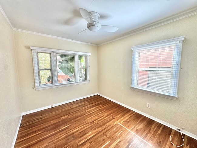 Building Photo - Cute North Park Bungalow! 2bd/1ba, 1 car garage, AC, W/D in-unit, fenced yard!