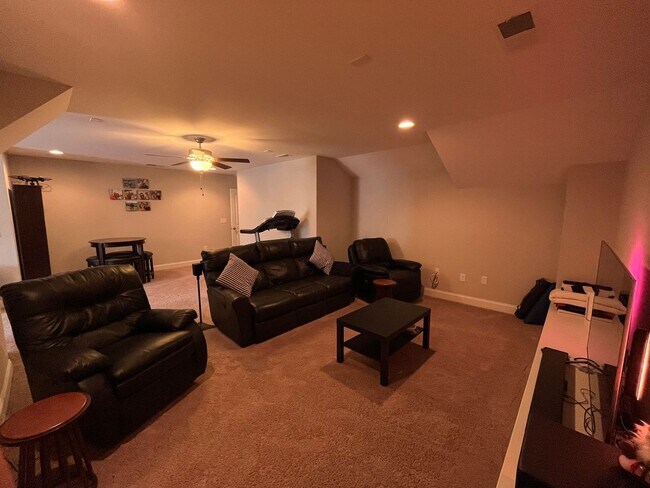 Building Photo - Exceptional 4BD, 2.5BA Cary Townhome with 2-Car Garage, Bonus 2nd Floor Living Space, and Private...