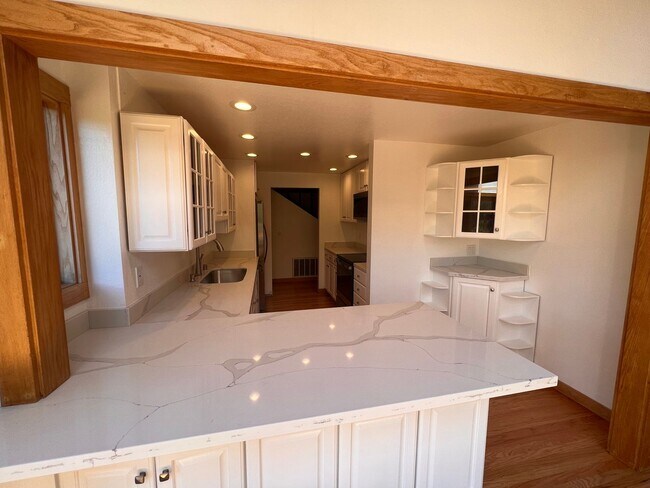 Building Photo - FOUR BEDROOM THREE BATH PLUS OFFICE UPDATE...